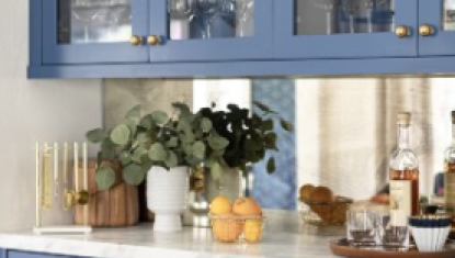 Blue kitchen cabinets with glass doors
